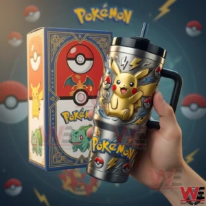 Hand holding a Pokemon insulated tumbler with handle and straw featuring Pikachu lightning and Pokeball details with a matching themed gift box and a soft blue background!