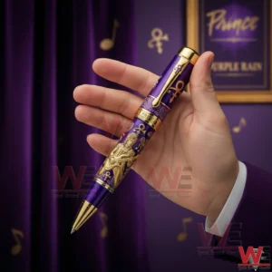 Prince Purple Rain Limited Edition Pen 3 A Close Up Of A Prince Inspired Pen In A Person Hand With Elegant Gold Trim And Purple Rain Theme Elements!
