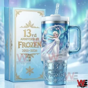 Frozen anniversary insulated tumbler with handle and straw displayed next to a matching gift box with winter themed design!