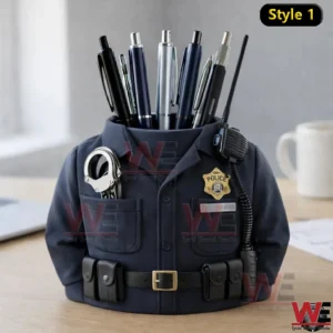 Police uniform shaped desk pen holder with badge handcuffs radio and multiple pens displayed on an office desk!