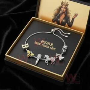 Gift boxed adjustable charm bracelet with letter B bee microphone unicorn cozy text and crystal charms inside a black and gold Queen B presentation box.