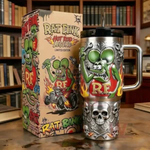 Stainless steel tumbler with handle and straw featuring Rat Fink green character RF flames skull graphics and a matching Rat Fink Hot Rod Legend limited edition box in front of bookshelves
