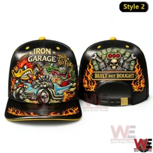 Front and back views of a black snapback cap with Iron Garage Rat Fink hot rod artwork and a Built Not Bought skull engine flame design.