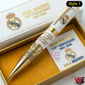 A Real Madrid anniversary pen rests neatly in its presentation box with sharp focus on craftsmanship and branding!