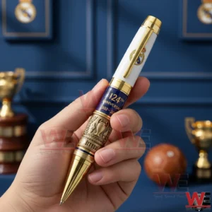 Hand holding a luxury football themed collectible pen in a stylish display setting!