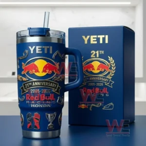 Blue Yeti Red Bull Racing 21st Anniversary tumbler with handle and straw displayed beside a matching gift box with a blurred pit lane racetrack background!