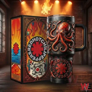 Black handled tumbler with embossed red octopus beside a Red Hot Chili Peppers themed gift box in a stage lit brick wall room!
