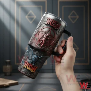 Hand holding a Rush insulated tumbler featuring starman and owl artwork in a stylish indoor setting!