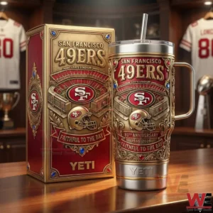 San Francisco 49ers insulated tumbler with handle and straw displayed next to a matching red and gold box on a wooden table!