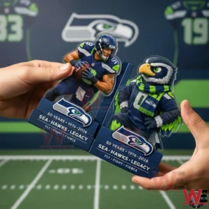 Seattle Seahawks 50th Anniversary Bookends 3 A person holding Seattle Seahawks bookends with a football player and hawk mascot figures in front of a football themed backdrop with Seahawks branding!