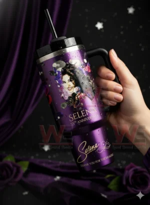 A hand holding a purple Selena commemorative tumbler with decorative portrait artwork and smooth premium surface!
