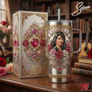 Selena themed insulated tumbler with decorative floral artwork and matching gift box on a wooden table!