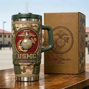 Camouflage handled insulated tumbler with straw featuring a gold eagle globe and anchor USMC emblem red shield raised USMC Semper Fidelis text and a tan embossed gift box in the background!