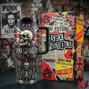 Sex Pistols Never Mind the Bollocks, Here's the 40oz Tumbler With Handle 4 Black insulated tumbler with handle and straw next to a matching punk themed box in an edgy environment!