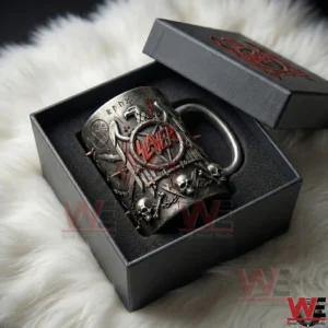 Metallic heavy metal mug with skull and eagle details placed in a black presentation box on a white textured background!