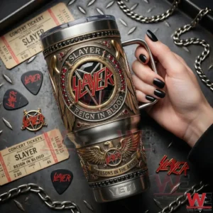 Hand holding a metal tumbler with heavy metal artwork surrounded by rock music accessories on an industrial background!