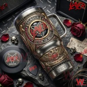 Metal tumbler with rock themed design placed on stone surface with skulls and music accessories!