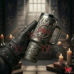 Slayer Reign in Blood South of Heaven 40oz Tumbler With Handle 3 Hand holding a metal themed handled tumbler with skull and ritual symbols in a dark ceremonial setting!