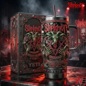 A YETI tumbler and decorative box with Slipknot design placed on a dark surface with smoke lighting and a bold metal atmosphere!