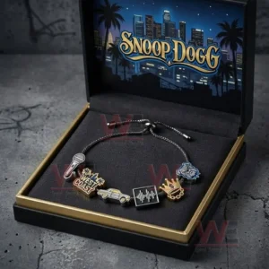 Silver adjustable charm bracelet in a black and gold gift box with Snoop Dogg skyline art featuring microphone West Coast lowrider soundwave crown and bulldog charms.