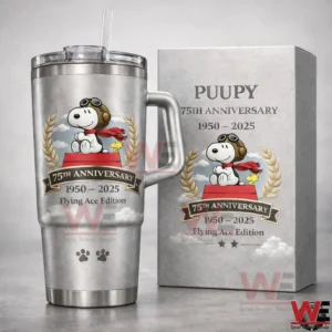 Silver handled tumbler with straw beside a matching collector box featuring a pilot dog illustration with aviator goggles red scarf laurel wreath and seventy fifth anniversary years one nine five zero to two zero two five flying ace edition!