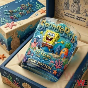 A collectible SpongeBob anniversary whisky glass presented in a themed display box with bright ocean inspired details and a twenty seven year celebration design!
