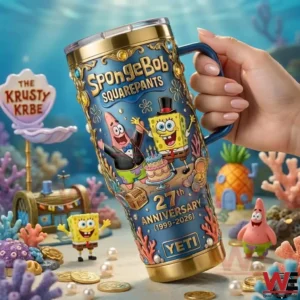 A hand holds a SpongeBob SquarePants anniversary tumbler with colorful cartoon graphics and underwater scenery in the background!