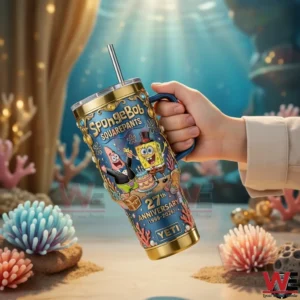 A hand holds a SpongeBob SquarePants anniversary tumbler surrounded by coral shapes and an imaginative underwater themed background!