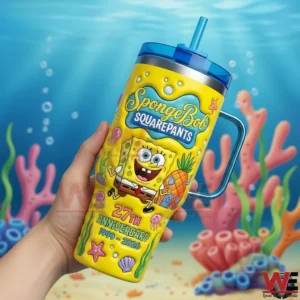 A hand holding a SpongeBob SquarePants anniversary tumbler featuring vibrant colors character art and a cheerful undersea design!