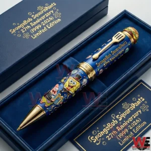 A SpongeBob SquarePants anniversary collectible pen displayed in a blue presentation box with character artwork and gold details!