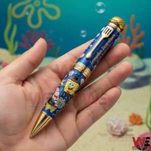 Spongebob Squarepants 27th Anniversary Pen 3 A hand holding a SpongeBob SquarePants anniversary collectible pen with blue design character artwork and underwater themed background!