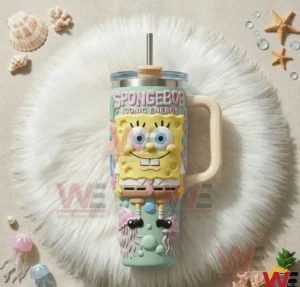 SpongeBob SquarePants themed tumbler with handle and straw displayed with shells and ocean themed decorative elements!