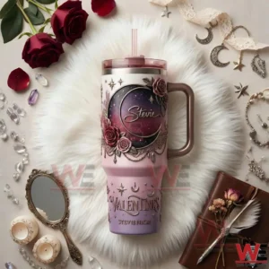 Stevie Nicks Valentines Edition 40oz Tumbler 5 An insulated tumbler with celestial moon design and floral details placed on a white fur surface with romantic accessories and vintage styling!