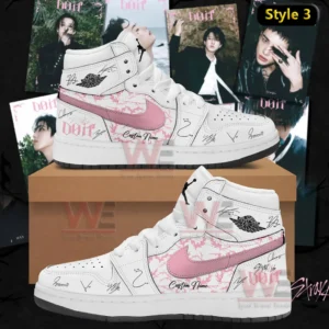 White high top Air Jordan one sneaker with pink swoosh pink patterned panels do it themed accents signature style markings and custom name shown on a shoebox with album background