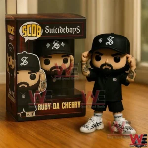 Suicideboys Ruby Da Cherry Pop Figure 5 Black dressed rapper vinyl figure standing beside a themed display box on a wooden floor!