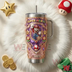 Super Mario themed tumbler with handle and straw surrounded by star mushroom and coin decorations on a white fluffy background!