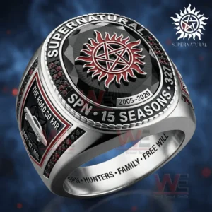 Close up of a silver ring with a black gemstone face showing the Supernatural anti possession symbol and engraved season anniversary text!