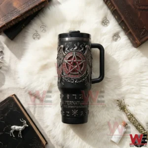 Top view of a black insulated tumbler with handle and straw featuring occult symbols on a soft background!