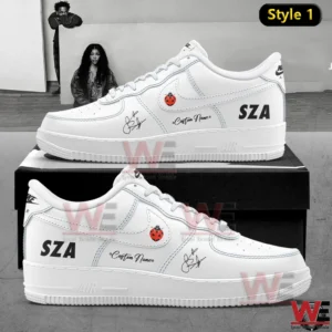 White custom sneakers with SZA name signature and small ladybug detail!