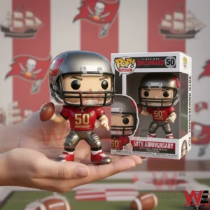 Hand holding a Tampa Bay Buccaneers fiftieth anniversary collectible football figure beside its branded box with a red team banner background!