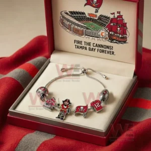 Gift boxed adjustable charm bracelet with Tampa Bay Buccaneers themed helmet pirate ship pirate figure flag and number twelve jersey charms inside a red presentation box.