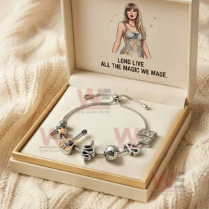Taylor Swift Long Live All the Magic We Made Adjustable Charm Bracelet 5 Silver adjustable charm bracelet in a cream and gold gift box with Long Live All The Magic We Made text and charms including microphone star guitar thirteen snake disco ball and TS letters!