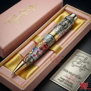 A Taylor Swift Themed Pen Shown In A Gift Box With The Eras Tour Branding And A Premium Display Plate!