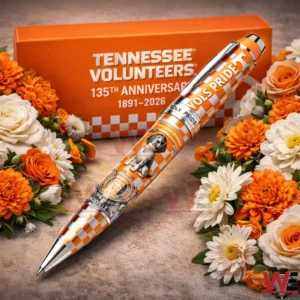 Tennessee Volunteers Vols Pride pen on a tabletop surrounded by orange and white flowers with a Tennessee Volunteers anniversary box in the background!