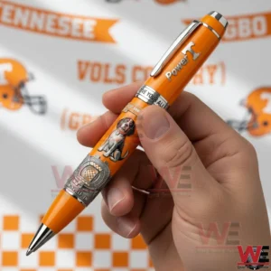 Tennessee Volunteers 135th Anniversary 1981-2026 Pen 8 Hand holding an orange Tennessee Volunteers Power T pen with silver clip and detailed stadium graphic in the lower barrel!