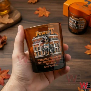 Tennessee Volunteers 135th Anniversary Edition 1891-2026 Give Your All Whiskey Glass 3 Hand holding a Tennessee Volunteers anniversary whiskey glass with mascot design and orange themed details in an autumn setting!