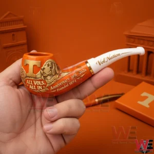 Tennessee Volunteers 135th Anniversary Pipe 3 Hand holding a Tennessee Volunteers commemorative pipe featuring orange and white colors gold accents and anniversary lettering.