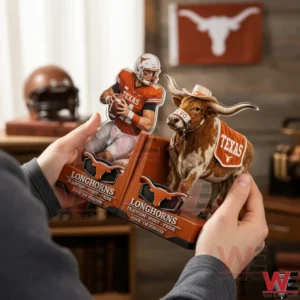Hands holding Texas Longhorns bookends featuring an orange uniform quarterback and the Bevo longhorn mascot with team branding.