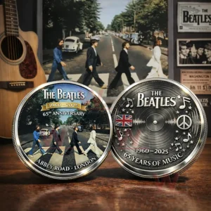 Two The Beatles anniversary coins showing Abbey Road London 1960 2025 65th Anniversary on one coin and a vinyl record with music symbols and 65 Years of Music on the other coin!