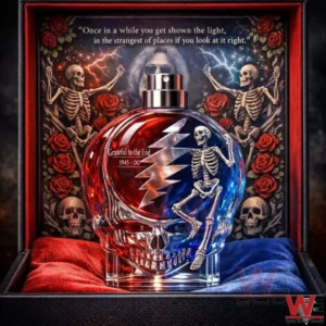 Memorial skull shaped perfume bottle with red and blue glass tones displayed in a decorative presentation box!